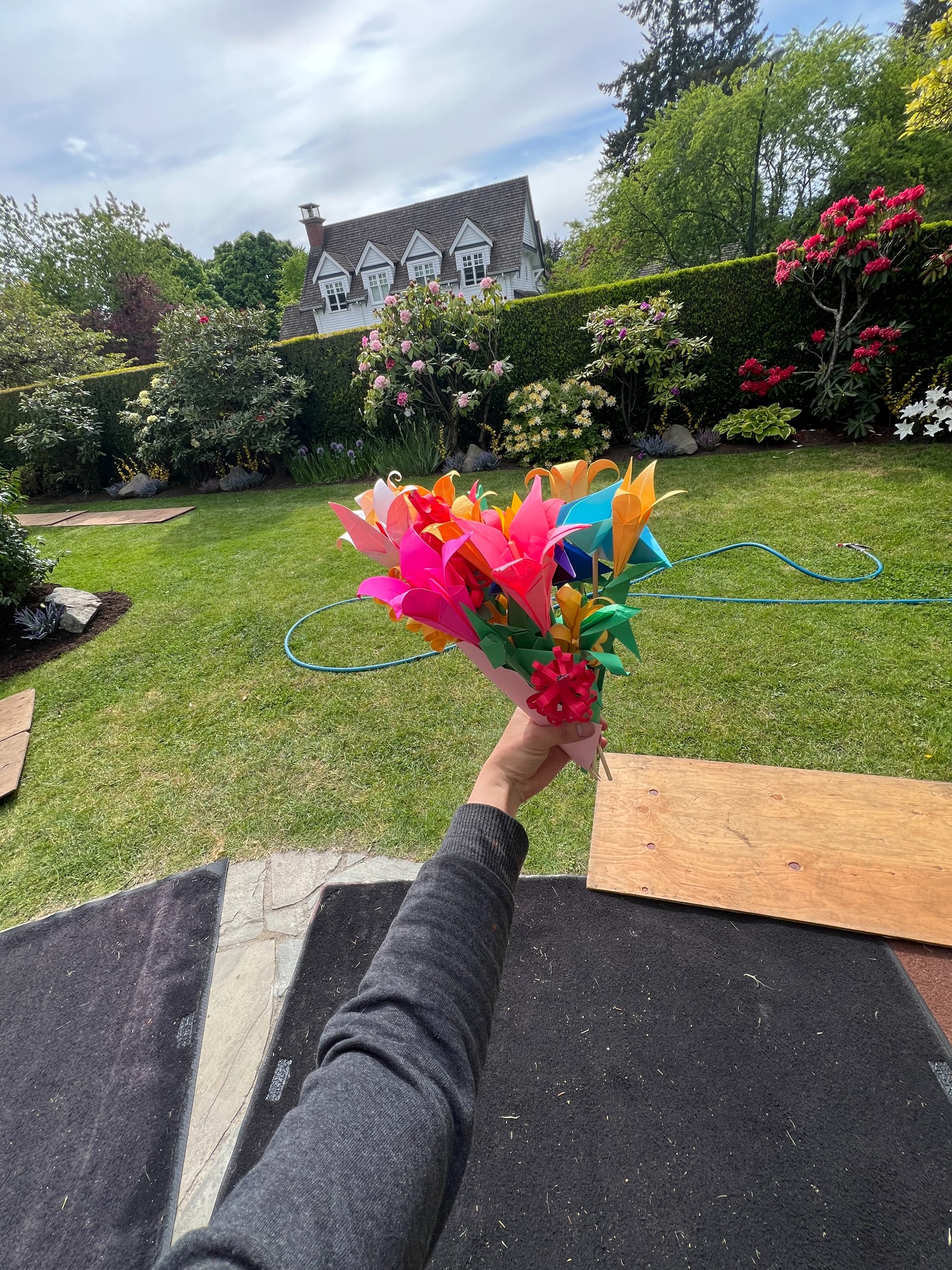 Brightly coloured origami flower bouquet built for camera