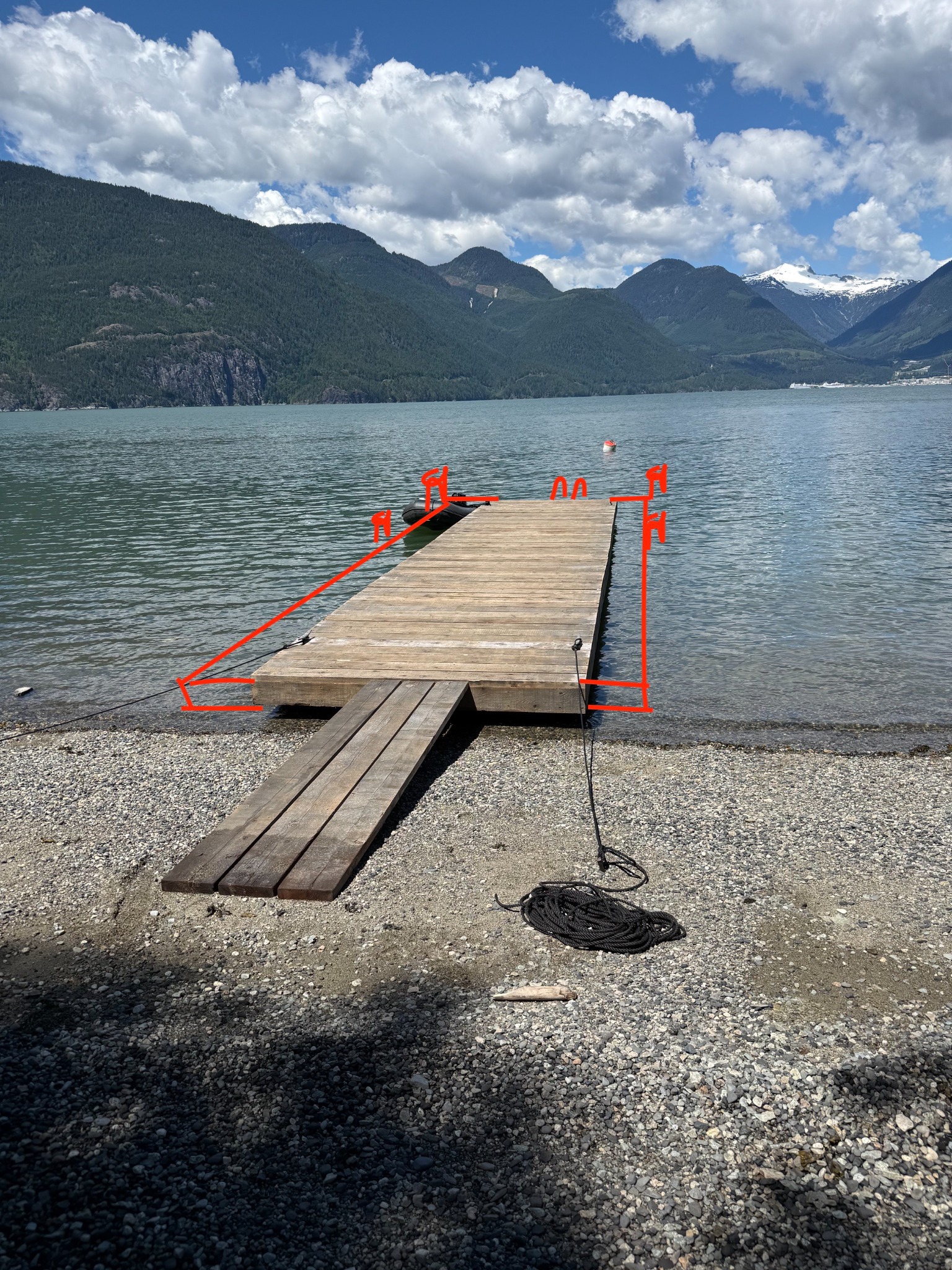 Original dock location photograph with production designer markup and requested modifications