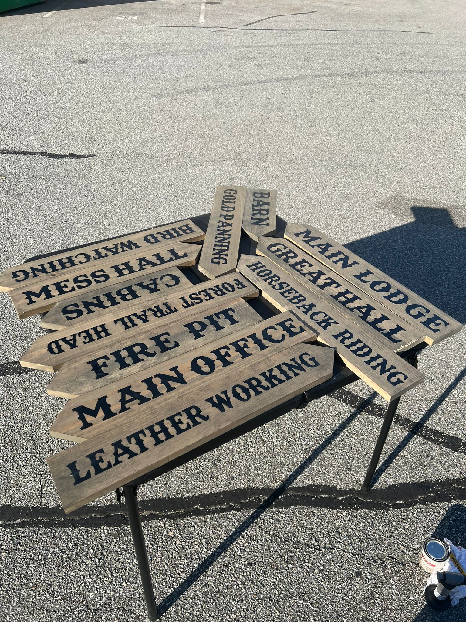 Printed Western storefront signs prepared for set